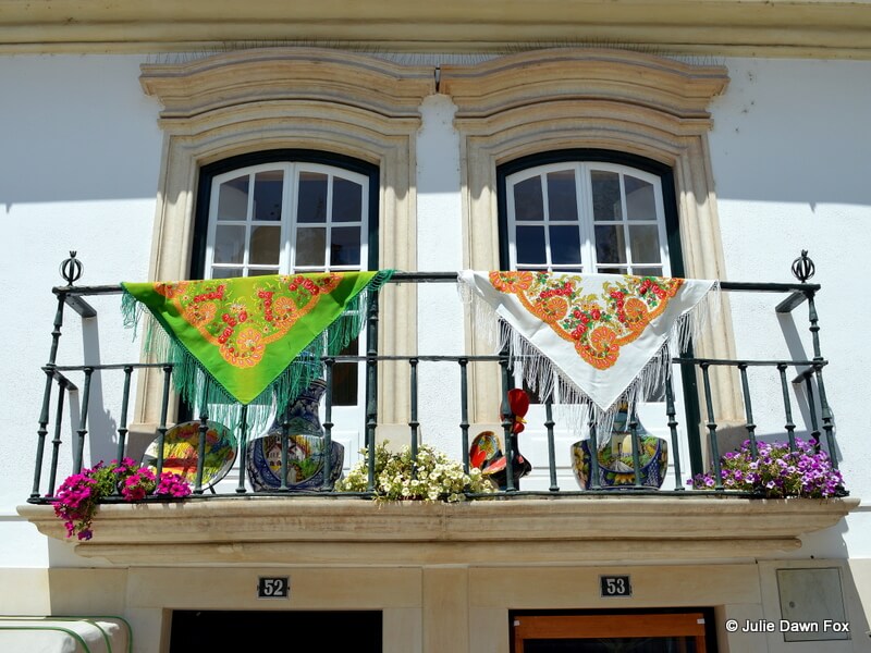 Windows above souvenir shop, Alcobaça